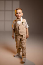 boys’ linen ring bearer suit set including tailored pants, vest, suspenders, and a bow tie
