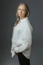 Side view of white women’s double gauze shirt with relaxed fit