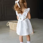 linen pinafore dress with open cross back design