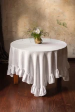 square ruffled linen table overlay